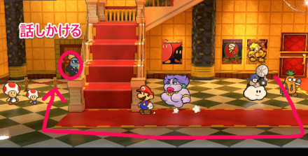 左側にいる黒服