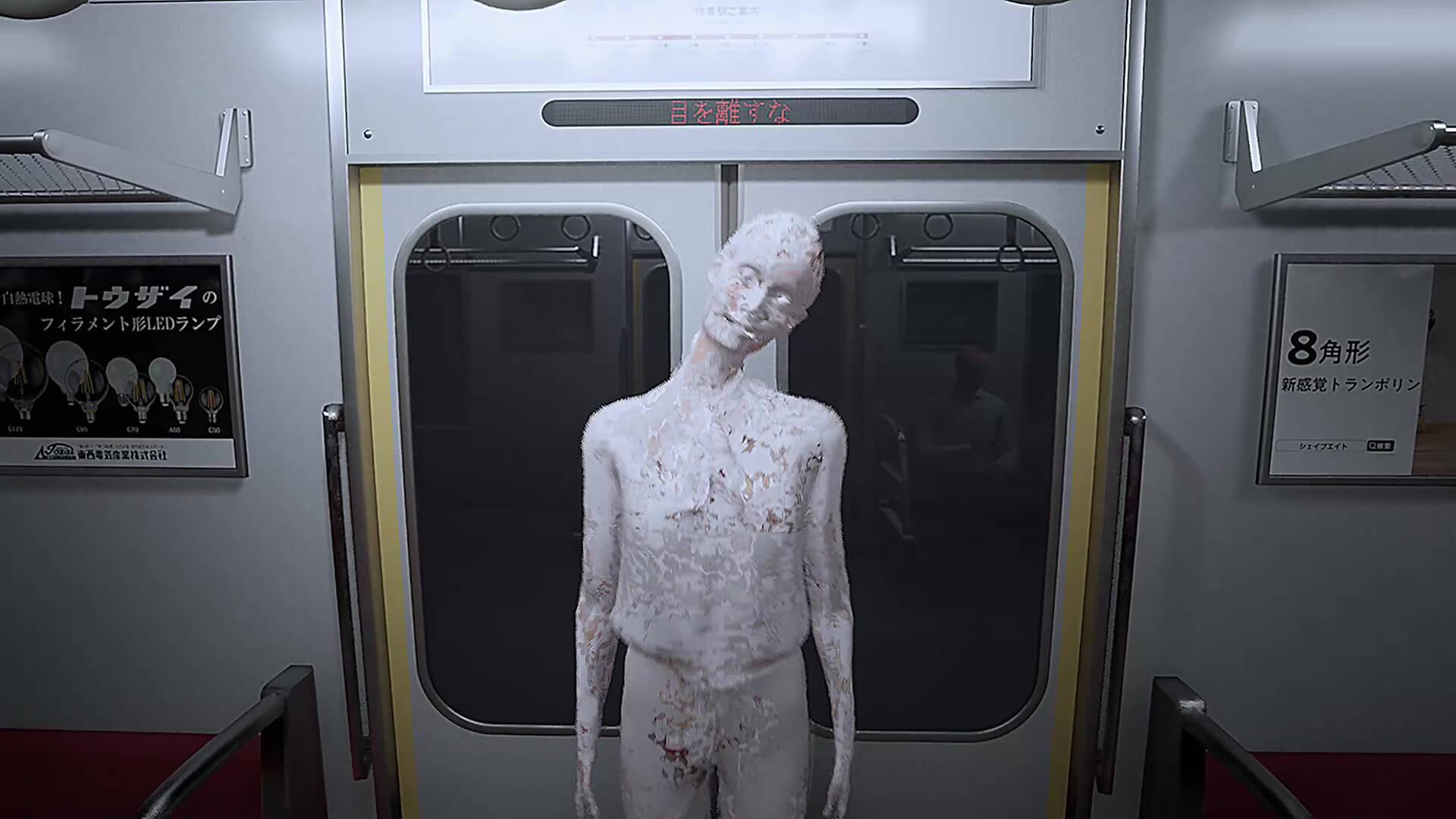 横のドアにマネキンがいる