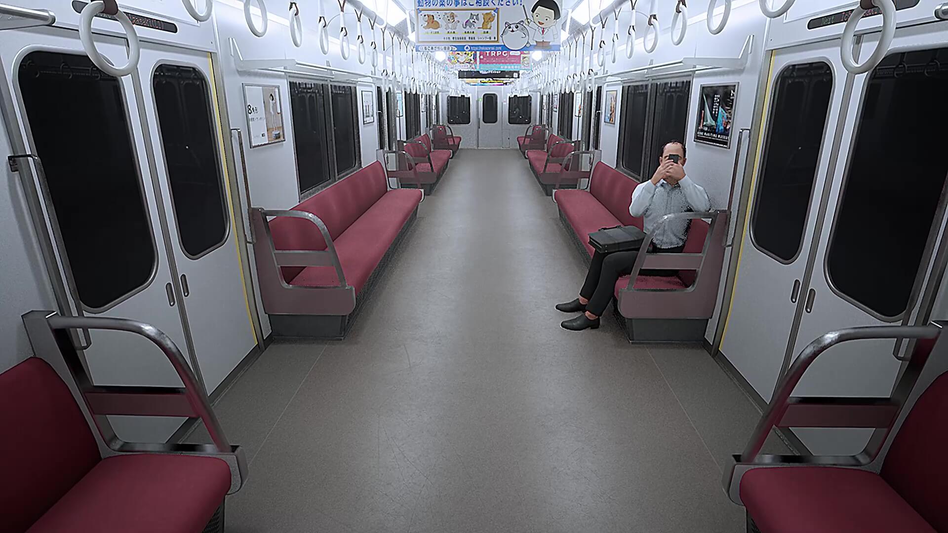 おじさんがカメラを向けてくる