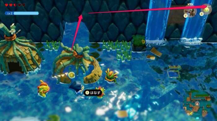 倒壊した家の裏から進む