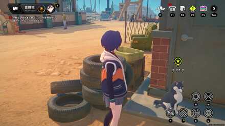 若者の向かいにいる子犬に話しかける