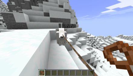 ヤギをリードで連れていく