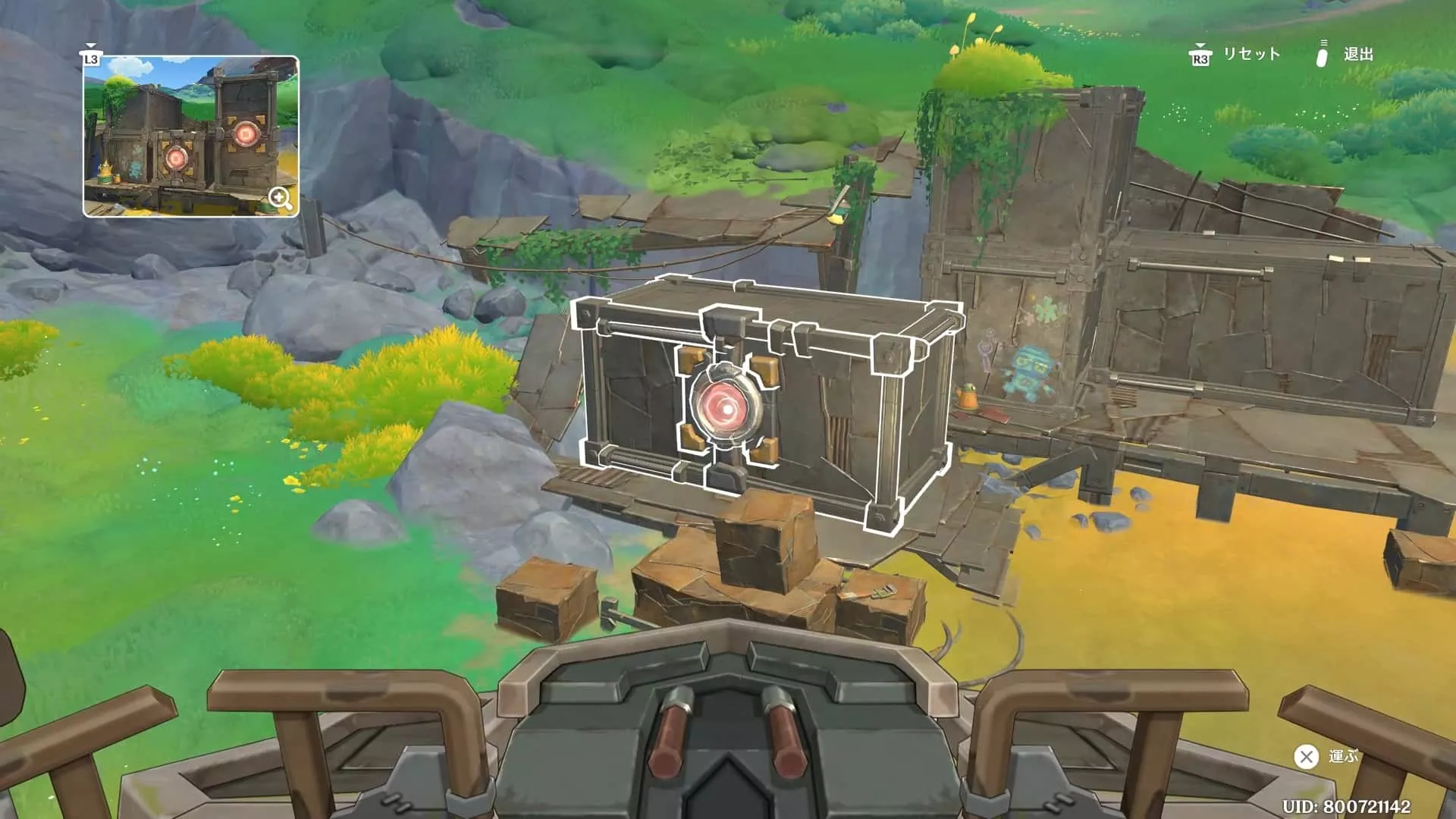 左上の完成図を確認しながら中央に赤いパーツがついた箱を持ち上げる