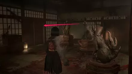 狐の像の鏃を抜いて