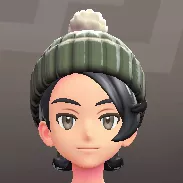 ポンポンつきニットキャップ