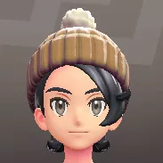 ポンポンつきニットキャップ