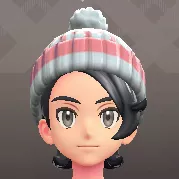 ポンポンつきニットキャップ