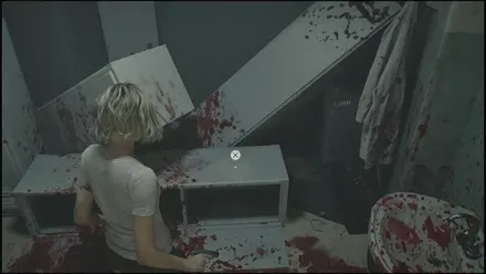 主任室の向かいにある部屋の倒れたロッカーの上