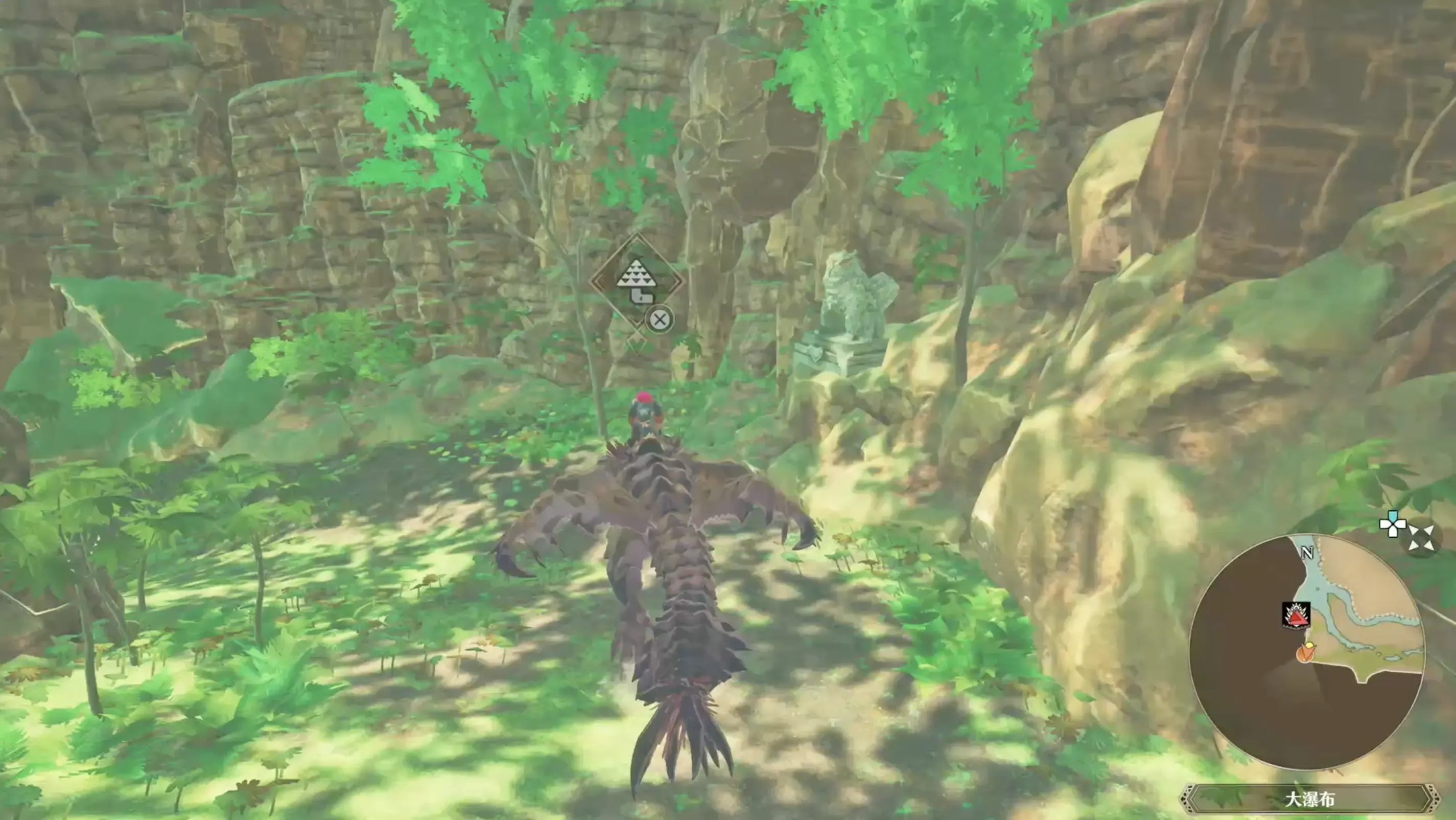 集落前にある石像の視線の先へ進む