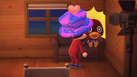 住民と一緒に写真を撮る