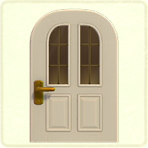 白い縦長窓のドア