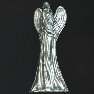 銀の女神像の画像