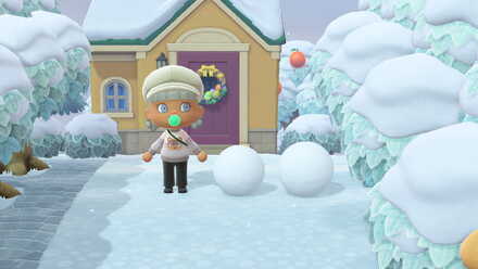 バランスを調整しつつ雪玉を乗せる