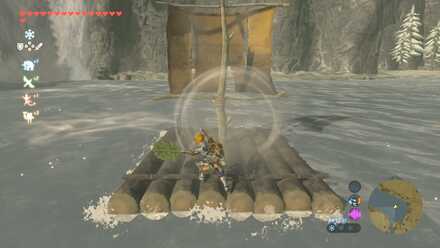 コログのうちわでイカダを動かす