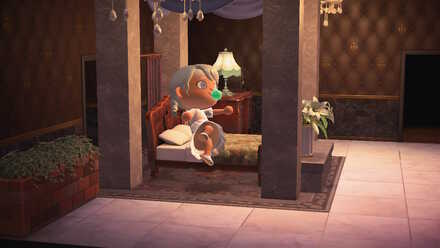 ベッドに向かって左スティックを倒す