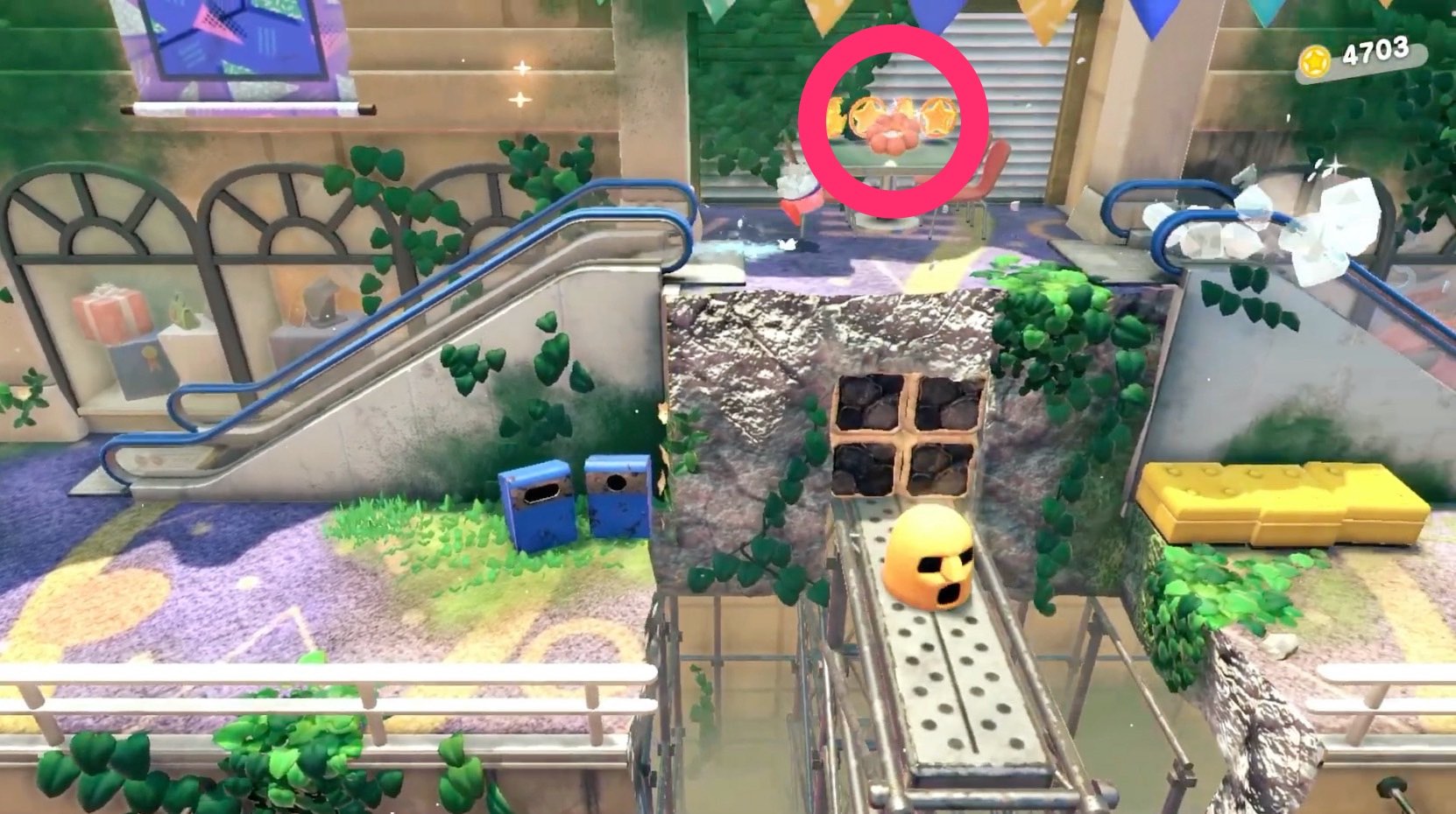 エスカレーターの上