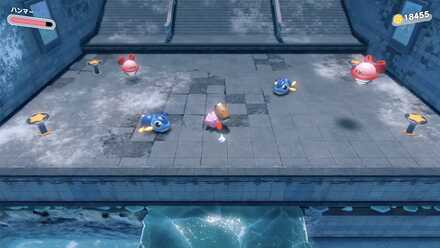 4箇所の釘をハンマーで打つ