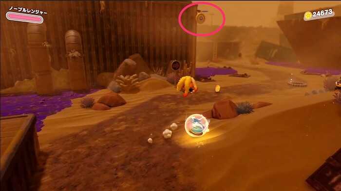 倒れてくる鉄柱の裏