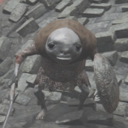 金属盾を持ったしろがね人