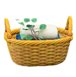 ラタンのタオルバスケットのライトブラウンの画像