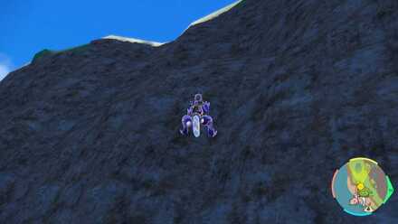 背後の崖を登る