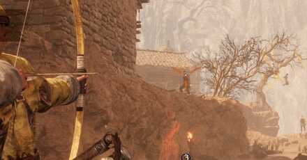 弓で狙撃する画像