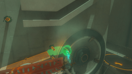 固定したボールを掴んで右下のレールの上に落とす