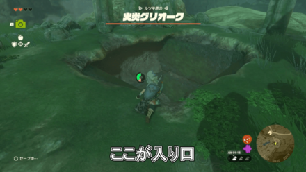 太い柱の上にあるスイッチを押す