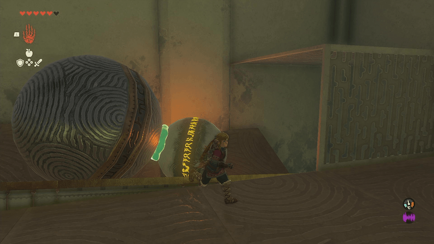 穴の手前でせき止められた球を回収する