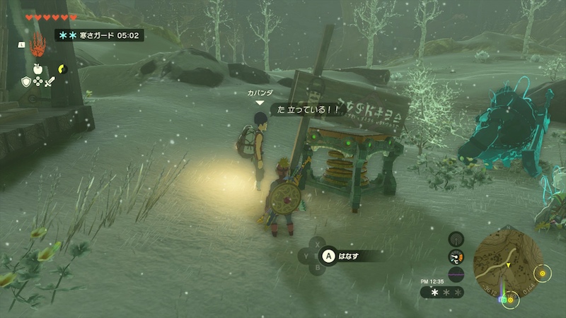 カバンダの看板をバネで支える