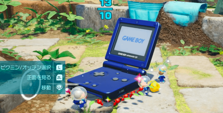 お宝の1つゲームボーイアドバンスSPを運んでいるピクミン