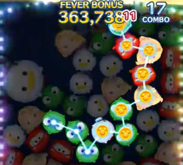 密集しているツムの中央をなぞっている画像